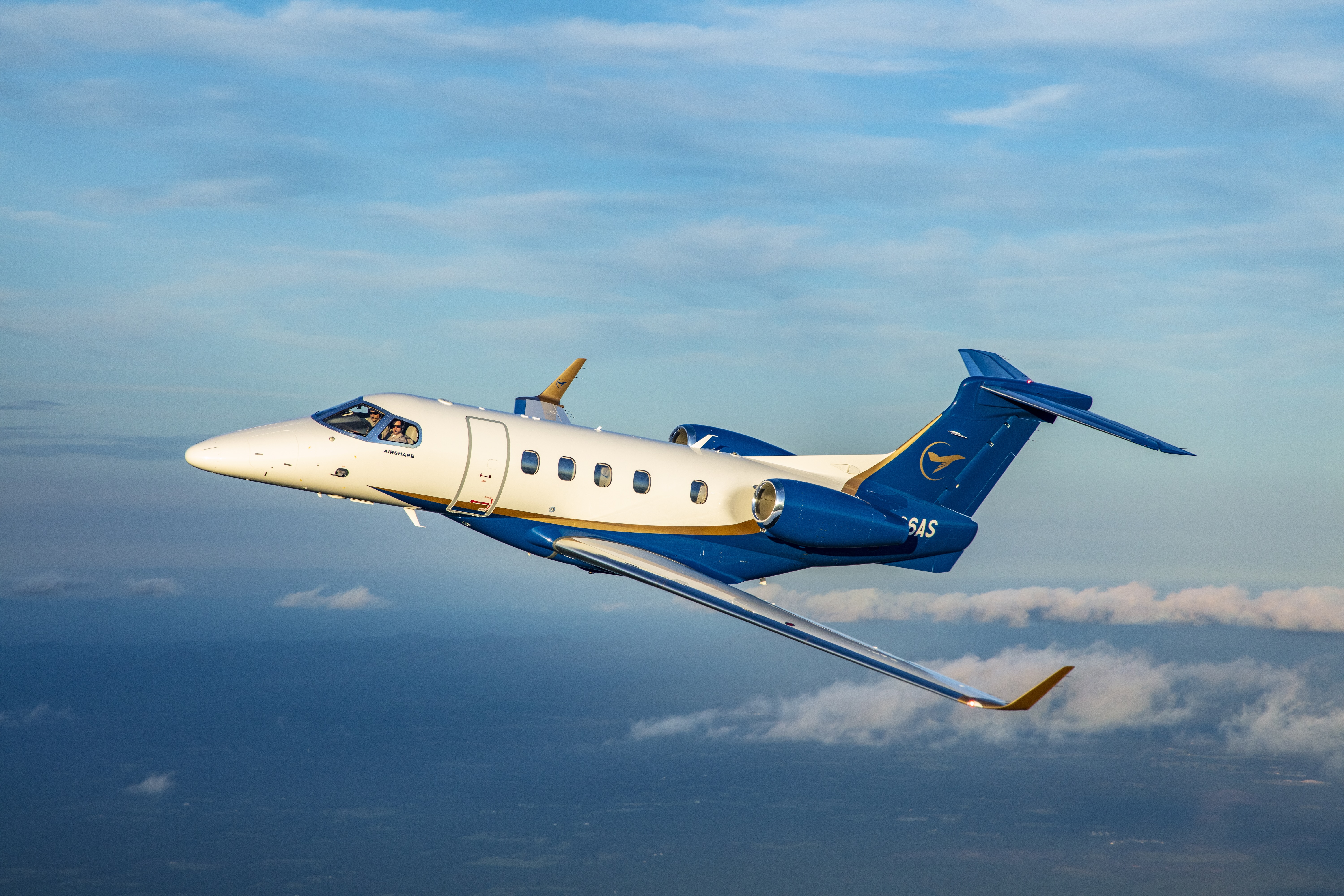 Phenom 300 flying through the sky Phenom 300 flying through the sky