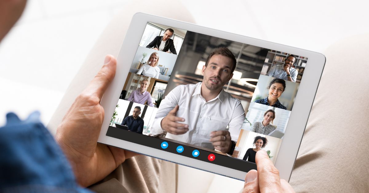 Person holding iPad on video meeting Person holding iPad on video meeting